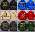 Love La Real LR hoodie in black, blue, beige, red, dark grey and dark green with gold grommet pocket details