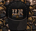 Love La Real black rhinestone hat with LLR logo
